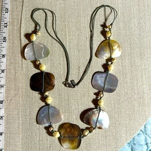 Mother of pearl and non-pearl beaded necklace about 34 inches long by J. Jill.